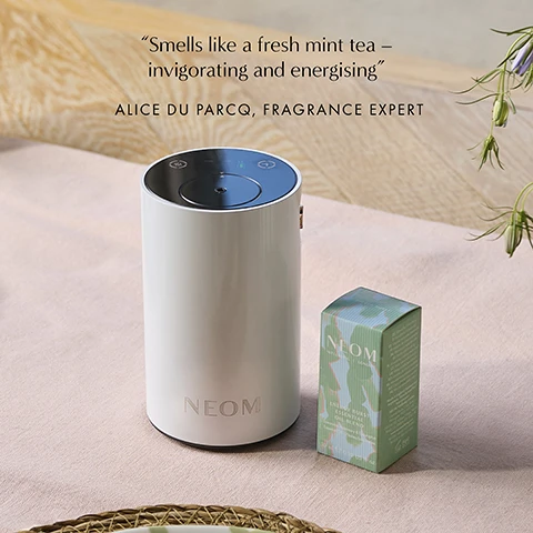 Image 1 - A white NEOM diffuser sits next to a green box of essential oil, with visible text that reads Smells like a fresh mint tea - invigorating and energising ALICE DU PARCQ, FRAGRANCE EXPERT NEOM ORGANICS LONDON ENERGY BURST ESSENTIAL OIL BLEND. Image 2 - A bottle of NEOM Energy Burst Essential Oil Blend and its box are shown on a green background with text that says STIMULATE THE SENSES AND SUPERPOWER YOUR DAY A potent blend of 6 pure essential oils 100% natural fragrances NEOM WELLBEING | LONDON ENERGY BURST ESSENTIAL OIL BLEND Spearmint, Rosemary & Eucalyptus Essential Oil - Dhuiles Essentielles 10 ml e 0.33 US fl. oz.