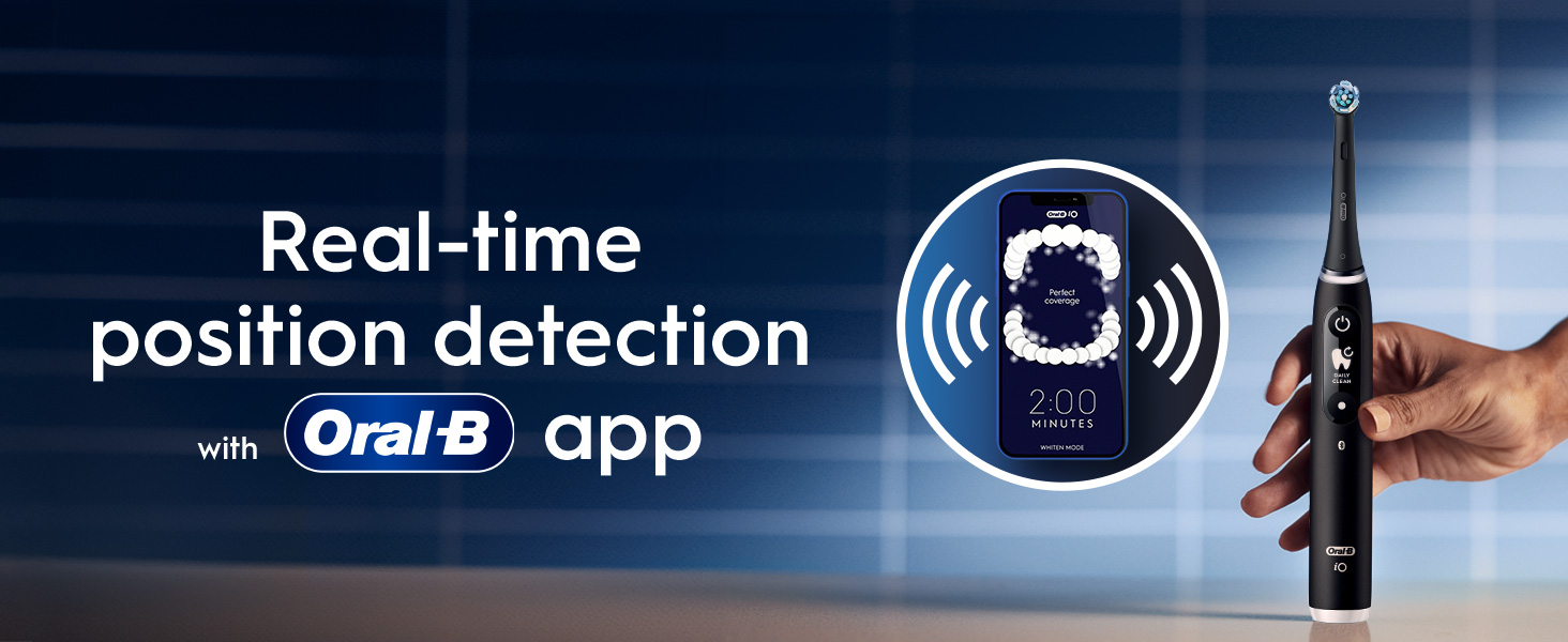 An Oral-B toothbrush with a close-up on the app showing real-time brushing tracking technology.