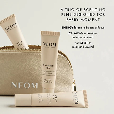 Image 1 - The image displays three light beige NEOM Wellbeing London 12 mL e 0.40 US fl. oz. scenting rollerball pens, a SLEEP PEN with Lavender, Patchouli & Chamomille, a CALMING PEN with Lavender, Roman Chamomile & Sweet Orange, and an ENERGY PEN with Eucalyptus, Rosemary & Fir, arranged with a matching NEOM branded cosmetic bag, alongside marketing text that reads A TRIO OF SCENTING PENS DESIGNED FOR EVERY MOMENT ENERGY for micro-boosts of focus CALMING to de-stress in tense moments and SLEEP to relax and unwind. Image 2 - Three light-colored rollerball pens are displayed vertically on a grid paper background, each with Neom Wellbeing | London, Rollerball - Applicateur a Bille, 12 ml e 0.40 US fl. oz. printed on them; from left to right, the pens are specifically labeled Energy Pen with Eucalyptus, Rosemary & Fir, Calming Pen with Lavender, Roman Chamomile & Sweet Orange, and Sleep Pen with Lavender, Patchouli & Geranium; text above the pens reads Your Caffeine-Free Wake-Up Call, Award-Winning Calming Pen, and 93% Said Its The Ideal Home Or Away Sleep Prep*, while a footnote below the pens states *Independent blind consumer study of 66 people, over 2 weeks. Image 3 - A light beige NEOM Energy Pen rollerball tube, open with its cap next to it, is positioned on a light background, with large text above reading 93% SAID IT IS THE PERFECT POCKET-SIZED ENERGY BOOST*, the product tube labeled NEOM WELLBEING | LONDON, ENERGY PEN, Eucalyptus, Rosemary & Fir, Rollerball - Applicateur à Bille, 12 mL e, 0.40 US fl. oz, and a footnote at the bottom stating *Independent blind consumer study of 67 people over 2 weeks. Image 4 - A hand applies a beige NEOM Energy Pen roll-on to a wrist, with text displayed on the image reading 100% natural fragrances. Eucalyptus, Rosemary, Fir. Roll onto pulse points whenever you need a boost of energy. The product is energetic. Helping me focus. The pen itself is labeled NEOM WELLBEING LONDON ENERGY PEN, Eucalyptus, Rosemary & Fir, Rollerball Applicateur a Bille, 12 mL e, 0.40 US fl. oz., and a footnote states Independent blind consumer study of 67 people over 2 weeks. Image 5 - A light beige Neom Sleep Pen rollerball tube with its cap off and a blurred product box in the background, featuring the text NEOM WELLBEING LONDON SLEEP PEN Lavender, Patchouli & Geranium Rollerball - Applicateur à Bille 12 mL e 0.40 US fl. oz., and a prominent claim that 89% SAID IT HELPED PREPARE FOR THE PERFECT NIGHTS SLEEP* *Independent blind consumer study of 66 people, after initial use over 2 weeks. Image 6 - A person with dark hair and a gold earring applies a beige rollerball product to their neck against a purple background, featuring the on-image text: 100% natural fragrances. Lavender, Patchouli, Geranium. Roll onto pulse points to help prepare for sleep. Instantly calming and allows me to totally relax* NEOM WELLBEING | LONDON SLEEP PEN Lavender, Patchouli & Geranium Rollerball - Applicateur à Billes 12 ml e 0.40 US fl. oz. *Independent blind consumer study of 66 people, over 2 weeks. Image 7 - A Neom Calming Pen tube with its cap removed and placed beside it, along with its product box in the background, displaying the text 81% SAID IT HELPED CREATE A SELF-CALMING RITUAL* NEOM WELLBEING | LONDON CALMING PEN Lavender, Roman Chamomile & Sweet Orange Rollerball - Applicateur à Bille 12 mL e 0.40 US fl. oz. *Independent blind study over 2 weeks on 52 people. Image 8 - A hand holds a beige Neom Calming Pen rollerball against a blue background, with visible text reading 100% natural fragrances. Lavender, Roman Chamomile, Sweet Orange. Roll onto pulse points whenever you need a moment of calm. I like the instant calmness. NEOM WELLBEING | LONDON CALMING PEN Lavender, Roman Chamomile & Sweet Orange Rollerball - Applicateur à Bille 12 mL e 0.40 US fl. oz. *Independent blind study over 2 weeks on 52 people.