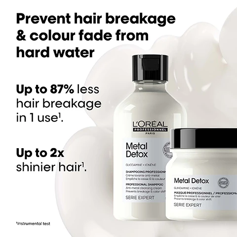 Image 2 - The image shows a tall LOréal Professionnel Metal Detox shampoo bottle and a shorter masque jar, both white with black caps, positioned against a white background with creamy white swirls, accompanied by the prominent text: Prevent hair breakage & colour fade from hard water, Up to 87% less hair breakage in 1 use¹, Up to 2x shinier hair¹, with the shampoo bottle labels reading LORÉAL PROFESSIONNEL PARIS Metal Detox GLICOAMINE + IONÈNE SHAMPOOING PROFESSIONNEL Crème lavante anti-métal Empêche la casse & la couleur professionnelle de virer PROFESSIONAL SHAMPOO Anti-metal cleansing cream Prevents breakage & color shift SERIE EXPERT and a circular seal with TECHNOLOGY EXCLUS, and the masque jar labels reading Metal Detox GLINOAMINE + IONÈNE MASQUE PROFESSIONNEL / PROFESSIONAL MASK Empêche la casse & la couleur de virer Prevents breakage & color shift SERIE EXPERT and a circular seal with TECHNOLOGIE INNOVATIVE TECHNOLOGY INNOVANTE, followed by the footnote ¹Instrumental test. Image 3 - The image shows three Before and After split panels of hair: long straight brown hair, short wavy reddish-orange hair, and long curly brown hair, each side by side depicting an improvement in shine, vibrancy, or definition, with the text Not retouched appearing three times, and a collection of LOreal Professional Metal Detox hair products with the text The full Metal Detox routine for all damaged hair. Image 4 - A clear, iridescent, organic-shaped blob with a crumpled metallic object inside is set against a black background, with text that reads THE TECH Glicoamine Traps and neutralises metal inside the fibre. Inside the fibre. It removes metal particles from hair. Image 5 - The image shows a three-step LOréal Professionnel Metal Detox anti-breakage professional routine featuring a shampoo, mask, and concentrated oil, with visible text including The anti-breakage professional routine, LOréal Professionnel Paris Metal Detox PROFESSIONAL SHAMPOO 300 ml anti-metal cleansing cream, Metal Detox PROFESSIONAL MASK 250 ml, and LOréal Professionnel Metal Detox PROFESSIONAL CONCENTRATED OIL 50 ml, all claiming to prevent breakage and color shift, with the oil also illuminating color, and steps labeled 01 Cleanse, 02 Treat, 03 Style. Image 6 - A hand holds a dollop of white cream or mask with the text Apply a dollop of mask evenly on lengths to ends.