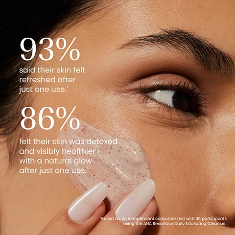 Image 1 - A persons hand applies a light pink exfoliating cleanser to their cheek, with text overlaid that reads 93% said their skin felt refreshed after just one use. 86% felt their skin was detoxed and visibly healthier with a natural glow after just one use. *Based on an independent consumer test with 35 participants using the AHA Resurface Daily Exfoliating Cleanser. Image 2 - A teal IZIL AHA & Algae Exfoliating Daily Cleanser tube stands centered on a rough brown rock, with a red poppy flower to its left and a halved pink grapefruit to its right, all against a beige background, featuring visible text on the tube that reads izil, AHA & ALGAE EXFOLIATING DAILY CLEANSER, EVEN SKIN TONE, POLISH & GLOW, AHAs, Witch Hazel, Red Algae, NETTOYANT DE JOUR EXFOLIANT AHA & ALGUES, مقشر ومفتح يومي للوجه, ALL SKIN TYPES, and floating text around the image that says WITCH HAZEL, RED ALGAE, AHAs. Image 3 - A hand holds a dark blue tube of izil AHA & ALGAE EXFOLIATING DAILY CLEANSER against a light background, with text on the left side of the image reading Evens skin tone, Unclogs pores, Refines texture, and text on the tube itself reading EVEN SKIN TONE POLISH & GLOW, AHAs, Witch Hazel, Red Algae, NETTOYANT DE JOUR EXFOLIANT AHA & ALGUES, تَنظيف وتَقْشِير يَوْمِي بِأَحْمَاضِ أَلْفَا هِيدْرُوكسِي وَالطَّحَالِبِ, ALL SKIN TYPES, and COSMOS NATURAL. Image 4 - A close-up of a light brown, textured, creamy substance with visible flecks and swirls, displaying the text: 99.1% NATURAL, HALAL, CRUELTY-FREE, FREE FROM GMOS, ALCOHOL, ARTIFICIAL COLOURS & FRAGRANCE, SULPHATES. Image 5 - An image shows four Izil skincare products, each labeled with a step: Exfoliate, Tone, Moisturise, and Mask, arranged with a red poppy, prickly pear, grapefruit slice, and rice on stone blocks against a beige background. The products are a blue tube labeled izil AHA & ALGAE EXFOLIATING DAILY CLEANSER, an orange bottle labeled izil AKER FASSI & RICE PROTEIN GLOW TONER, a green jar labeled izil AKER FASSI & OIL LIGHTWEIGHT GLOW CREAM, and a dark jar labeled izil AKER FASSI INSTANT GLOW FACE MASK. Image 6 - The image shows two skincare product tubes side-by-side, separated by a vertical line, illustrating an old dark green tube with a white and brown label and a new teal blue tube with white text, with visible text reading New Look, Same formula you love, and on the old tube izil, 0 RADIANCE, AHA RESURFACE, DAILY EXFOLIATING CLEANSER, and on the new tube izil, AHA & ALGAE EXFOLIATING DAILY CLEANSER, EVEN SKIN TONE POLISH & GLOW.