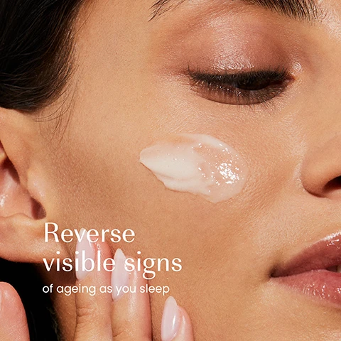Image 1 - A close-up of a persons face with a dollop of light pink cream on the cheek and a hand with manicured nails visible, with the text Reverse visible signs of ageing as you sleep. Image 2 - A dark green jar of izil Prickly Pear & HA Regenerating Cream is displayed with whole and sliced prickly pears in glass cylinders, with text labels reading Seaweed Extract, Red Algae, and Hyaluronic Acid, and the jar label also states Plump, Moisturise & Visibly Firm Skin, Crème Régénérante à la Figue de Barbarie et AH, and 10G. Image 3 - A hand holds a dark teal jar of face cream with a speckled dark lid, with the visible text izil PRICKLY PEAR & HA REGENERATING CREAM PLUMP, MOISTURISE & VISIBLY FIRM SKIN CRÈME RÉGÉNÉRATRICE À LA FIGUE DE BARBARIE & AH كريم التجديد بالتين الشوكي وحمض الهيالورونيك 10 Moisturises Firms skin Plumps. Image 4 - A close-up of a creamy beige substance with smooth, undulating textures, displaying the text 96.5% NATURAL, HALAL, SILICONE-FREE, CRUELTY-FREE, FREE FROM GMOs, ALCOHOL, ARTIFICIAL COLOURS & FRAGRANCE. Image 5 - Three dark green IZIL skincare products - a dropper bottle, pump bottle, and jar - are arranged with sliced red prickly pear fruit, wheat, and amber stones on a tan background; the dropper bottle, marked Renew, reads IZIL PURE REGENERATING PRICKLY PEAR OIL SMOOTHS FINE LINES & WRINKLES BRIGHTENS SKIN TONE 100% ORGANIC 30 ml / 1 fl. oz., the pump bottle, marked Plump, reads IZIL PRICKLY PEAR & CACI REGENERATING FACE SERUM SMOOTHS FINE LINES & WRINKLES BRIGHTENS SKIN TONE 30 ml / 1 fl. oz., and the jar, marked Firm, reads IZIL PRICKLY PEAR & CACI REGENERATING CREAM ANTI-AGEING & NOURISHING SMOOTHS FINE LINES & WRINKLES 50 ml / 1.7 fl. oz. Image 6 - The image shows two jars of Izil regenerating cream side-by-side, representing an old look dark amber jar on the left and a new look dark green jar on the right, with the visible text New Look, Same formula you love, izil De-Spot REGENERATING CREAM, and izil PRICKLY PEAR & HA REGENERATING CREAM, PLANT MOISTURE & YOUTH, crème régénérante figue de barbarie et acide hyaluronique.
