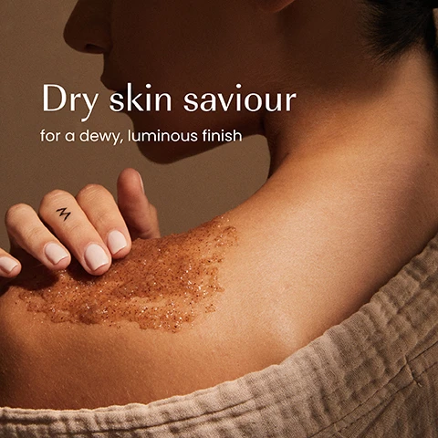 Image 1 - A persons shoulder has a brown granular body scrub applied by a hand with a small M tattoo on the index finger, displaying the text Dry skin saviour for a dewy, luminous finish. Image 2 - A product shot featuring an izil Golden Honey & HA Hydrating Toner bottle on a stone, surrounded by fresh orange blossoms and a glass with honeycomb dripping honey, against a beige background, with visible text izil GOLDEN HONEY & HA HYDRATING TONER HYDRATE PLUMP & SOOTHE Orange Blossom Water Manuka Honey - Hyaluronic Acid TONIFIANT HYDRATANT AU MIEL AMBRÉ ET À AH تونفانت مرطب بالعسل الذهبي وحمض الهيالورونيك DRY, NORMAL & COMBO SKIN TYPES HYALURONIC ACID ORANGE BLOSSOM WATER MANUKA HONEY Ecocert Cosmos Organic Vegan. Image 3 - A hand holds a clear jar of brown granular body scrub, with a finger scooping out some of the product, displaying the text izil GOLDEN HONEY NOURISHING ALMOND SCRUB EXFOLIATE, MOISTURISE & NOURISH ARGAN OIL, SWEET ALMOND, WHEAT GERM, SHEA BUTTER GOMMAGE MIEL AMBRE NOURRISSANT & AMANDE مقشر العسل الذهبي باللوز Moisturisers Nourishes Exfoliates. Image 4 - A close-up of a textured brown body scrub with visible granules, showing text that reads 99.13% NATURAL HALAL MICROPLASTICS-FREE CRUELTY-FREE FREE GMOs, ALCOHOL, ARTIFICIAL COLOURS & FRAGRANCE, SULPHATES. Image 5 - Four izil skincare products, a Golden Honey & HA Hydrating Toner, a Golden Honey & Saffron Moist & Luminous Face Mask, a Pure Regenerating Prickly Pear Oil, and a Golden Honey Nourishing Almond Scrub, are artfully arranged with elements like saffron threads, almonds, honeycomb, and white flowers on a neutral background; the toner is labeled Plump, HYDRATE, PLUMP & SOOTHE, ENHANCE SKINS NATURAL GLOW, 99.5% NATURAL & 100% VEGAN; the face mask is labeled Nourish, NOURISH, BRIGHTEN & MOISTURISE, 100% NATURAL & 100% VEGAN; the oil is labeled Moisturise, 100% NATURAL; and the scrub is labeled Exfoliate, EXFOLIATE, MOISTURISE & NOURISH, 99.5% NATURAL & 100% VEGAN. Image 6 - The image displays two Izil Golden Honey product jars side by side, labeled New Look and Same formula you love. The older jar on the left has a dark green label and black lid, showing text Izil GOLDEN HONEY NETTOYANT, MASQUE & SCRUB, with ingredients HONEY, JOJOBA, & ARGAN OIL, describing itself as DEEPLY EXFOLIATE, MOISTURIZE & NOURISH for NORMAL - DRY SKIN, in a 120ml e 4fl.oz. size. The newer jar on the right has a brown label and dark teal lid, showing text Izil GOLDEN HONEY NOURISHING ALMOND SCRUB, with effects EXFOLIATE, MOISTURISE & NOURISH, ingredients ARGAN OIL - SWEET ALMOND - WHEAT GERM OIL, and benefits ROUGHNESS, UNIFIES SKIN TONE يرطب ويوحد لون البشرة, also in a 120ml e 4fl.oz. size.