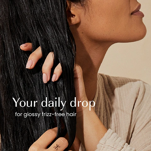 Image 1 - A person with dark, wet hair running their fingers through it, with text Your daily drop for glossy frizz-free hair. Image 2 - A hand with light pink nail polish holds a clear bottle of Izil Nutricare Hair Shine Serum with a dark teal pump, containing golden liquid, against a light background, with text on the left reading Tames frizz, Adds shine, Protects, and text on the bottle reading Izil NUTRICARE HAIR SHINE SERUM STRENGTHEN, TAME FRIZZ & ADD SHINE 12 SERUM CHEVEUX BRILLANCE سيرم لمعان الشعر نوتريكير ALL HAIR TYPES. Image 3 - A close-up of a viscous, light amber liquid with bubbles and text that reads 100% NATURAL, HALAL, NATURAL FRAGRANCE. Image 4 - A split image displays two hair serum bottles, an older white spray bottle on the left labeled izil NOURISH NUTRICARE HAIR SERUM FOR VOLUME FOR DRY SCALP, and a newer clear bottle with a dark blue cap on the right labeled izil NUTRICARE HAIR SERUM STRENGTHENING YOUR ROOT & HAIR GROWTH, with the text New Look Same formula you love positioned above them.