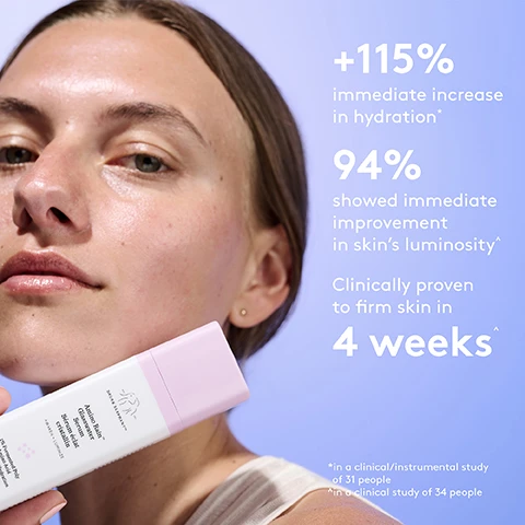 Image 1 - A woman with clear skin holds a white and pink bottle of Drunk Elephant Amino Rain Glasswater Serum, with visible text on the bottle reading DRUNK ELEPHANT, Amino Rain Glasswater Serum, Sérum éclat Cristallin, AWAKEN + LUMINZE; to her right, text on a light purple background states +115% immediate increase in hydration*, 94% showed immediate improvement in skin’s luminosity^, Clinically proven to firm skin in 4 weeks^, *in a clinical/instrumental study of 31 people, ^in a clinical study of 34 people. Image 2 - A side-by-side comparison image shows a womans face with the left panel labeled BEFORE depicting skin with some texture and the right panel labeled IMMEDIATELY AFTER showing more radiant and luminous skin, followed by text reading 94% of people showed immediate improvement in skins radiance and luminosity in a clinical study of 34 people. Image 3 - An infographic titled KEY INGREDIENTS displays three circles showing different liquid textures—clear, blue, and pink—each detailing a key skincare ingredient: 1.0% fermented poly amino acid, also known as polyglutamic acid, which at 1.0% helps provide powerful, long-lasting hydration benefits; Hiya Super Hydration Water Complex, containing four types of hyaluronic acid that help deliver and lock in continuous 24-hour hydration; and 0.5% dipalmitoyl hydroxyproline, also known as the super amino acid, which has powerful peptide-like benefits for skin, helping to boost hydration levels while improving elasticity and firmness. Image 4 - A comparison chart displays three Drunk Elephant hydration serums, Amino Rain Glasswater Serum with a pink cap, B-Hydra Intensive Hydration Serum with a blue cap, and C-Luma Hydrabright Serum with an orange cap, each shown in its bottle with a description of its benefits and ingredients; the chart is titled FACE-OFF: HYDRATION EDITION and details Amino Rain Glasswater Serum benefits: Deeply hydrates, boosts luminosity, and firms, with ingredients Polyglutamic acid, Four types of hyaluronic acid; B-Hydra Intensive Hydration Serum benefits: Provides daily hydration, with ingredients Pro-vitamin B5, Sodium hyaluronate; and C-Luma Hydrabright Serum benefits: Brightens and reduces blemishes, with ingredient 10% vitamin C, while also stating KEY BENEFITS ALL DELIVER HYDRATION INSTANTLY AND OVER TIME and KEY INGREDIENTS. Image 5 - Shimmering golden-orange liquid with iridescent highlights is spread on a light purple background, with the text OPALESCENT WATER SERUM displayed on the left. Image 6 - A close-up of a person applying a light-colored cream to their cheek, with visible text that reads Deeply hydrates and adds a pop of opalescence while firming skin.