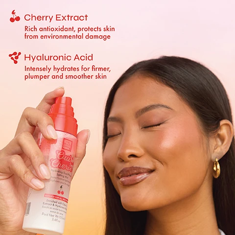 Image 2 - A smiling woman with closed eyes sprays a white and red bottle of face mist onto her skin, with text on the left describing Cherry Extract as a rich antioxidant that protects skin from environmental damage, and Hyaluronic Acid as intensely hydrating for firmer, plumper and smoother skin; the bottle label reads THE BEAUTY CROP OUI CHERIE Hydrating Dual-Phase Setting Mist, Brume fixatrice hydratante biphasée pour le visage, SUITABLE FOR ALL SKIN TYPES, Enriched with Cherry Extract & Hyaluronic Acid, Enrichi en acide hyaluronique & extrait de cerise, Poid Net Wt 100g e, 3.4fl.oz. Image 3 - A hand holds a pink and clear dual-phase setting mist bottle with a red sprayer, labeled THE BEAUTY CROP Oui Cherie Hydrating Dual-Phase Setting Mist, Brume fixatrice hydratante biphasée pour le visage ou le corps, SUITABLE FOR OILY SKIN, Enriched with Cherry Extract & Hyaluronic Acid, Enrichi en acide hyaluronique et extrait de cerise, Poids Net Wt 100ml e 3.4fl.oz., with additional text on the pink background: Hydrates and refreshes, Suitable for blemish-prone skin, Leaves skin with a dewy, radiant finish.