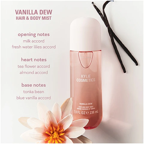 Image 1 - A pink bottle of Kylie Cosmetics Vanilla Dew Hair & Body Mist is displayed with two vanilla beans and a pink water lily flower, featuring descriptive text VANILLA DEW HAIR & BODY MIST, opening notes milk accord fresh water lilies accord, heart notes tea flower accord almond accord, base notes tonka bean blue vanilla accord, and on the bottle KYLIE COSMETICS VANILLA DEW HAIR AND BODY MIST BRUME CHEVEUX ET CORPS 7.9 FL OZ e 236 ML. Image 2 - A close-up of a pink and orange flower with dark vanilla beans intertwined among its petals, with the text a milky, vanilla, floral gourmand fragrance. Image 3 - Three Kylie Cosmetics Hair and Body Mist bottles are shown side by side against a light grey background, the left bottle for Sweet Éclair has a peach cap and golden liquid depicting an eclair with whipped cream, the middle bottle for Vanilla Dew has a light pink cap and clear liquid featuring a pink water lily, and the right bottle for Caramel Cloud has a cream cap and golden-brown liquid displaying caramel cubes, with visible text including SWEET ÉCLAIR velvety, warm, decadent, VANILLA DEW creamy, milky, airy, CARAMEL CLOUD nutty, cozy, indulgent, and on each bottle KYLIE JENNER KYLIE COSMETICS followed by its specific scent name SWEET ÉCLAIR, VANILLA DEW, or CARAMEL CLOUD, then HAIR AND BODY MIST BRUME CHEVEUX ET CORPS 7.9 FL OZ e 236 mL. Image 4 - A partial view of a perfume bottle with an iridescent top and dark spherical base is shown next to a full light beige cylindrical spray bottle for hair and body mist, with text reading: can be layered with another mist of the collection or a cosmic kylie jenner eau de parfum, and on the spray bottle: KYLIE JENNER KYLIE COSMETICS VANILLA DEW HAIR AND BODY MIST BRUME CHEVEUX ET CORPS 7.9 FL OZ 236 ML. Image 5 - Three bottles of Kylie Jenner Kylie Cosmetics Hair and Body Mist are displayed against a day to night background, featuring a pink Vanilla Dew mist, a yellow Caramel Cloud mist, and an amber Sweet Solair mist, each labeled 7.9 FL OZ / 236 mL, under the main text mists that take you from day to night. Image 6 - A still life image shows three Kylie Cosmetics fragrance bottles on a light pink surface: an upright yellow bottle with a cream cap, an upright pink bottle with a white spray top, and an orange bottle lying on its side with its cream cap beside it, alongside text that reads for a more indulgently sweet scent: layer sweet éclair over vanilla dew or caramel cloud. for a creamier, softer scent: layer vanilla dew over sweet éclair or caramel cloud. for a nuttier, richer scent: layer caramel cloud over vanilla dew or sweet éclair. Each bottle is labeled KYLIE COSMETICS 7.9 FL OZ / 236 mL, with the yellow bottle specifically marked VANILLA DEW, the pink bottle SWEET ÉCLAIR, and the orange bottle CARAMEL CLOUD.