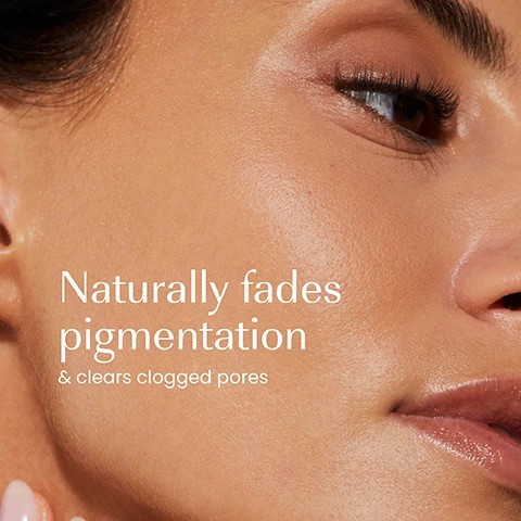 Image 1 - Close-up of a persons clear skin, featuring the cheek, eye, and mouth, with the text Naturally fades pigmentation & clears clogged pores. Image 2 - A person holds a dark teal tube of Izil Green Tea Balancing & Brightening Scrub, which states it Exfoliates, Brightens & Nourishes with Argan Oil, Aloe vera, Apricot Oil, also translated as Gommage Équilibrant et Éclaircissant au Thé Vert and مقشر شاي اخضر للتوازن والاشراقة, and is suitable for Normal, Combo & Oily Skin Types, while text beside it lists benefits: Reduces excess oil, Refines pores, Exfoliates, Brightens. Image 3 - A collection of Izil skincare products is artfully arranged on stone with a sliced papaya and green tea leaves against a brown background. Visible text includes the categories Clarify, Balance, Detoxify, Renew, Exfoliate, and product labels for izil GREEN TEA OIL CONTROL GEL CLEANSER REDUCE EXCESS OIL BRIGHTEN & DETOXIFY, izil GREEN TEA & SAUCIER PORE-CLARIFYING TONER REDUCE OIL DEEP CLEANSE TONES & BRIGHTEN, izil PURE REJUVENATING PRICKLY PEAR OIL, izil GREEN TEA PORE CLARIFYING CLAY MASK, and izil GREEN TEA BALANCING & BRIGHTENING SCRUB EXFOLIATE BRIGHTEN & NOURISH.