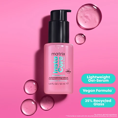 Image 1 - A pink bottle of Matrix InstaCure Billion Bond Oil with a black pump is displayed on a pink background, surrounded by pink liquid droplets, with text reading Lightweight Gel-Serum, Vegan Formula, 25% Recycled Glass, and on the bottle: matrix instaCure Build-A-Bond Billion Bond Oil bond strengthening & shine oil 1.69 FL OZ / 50 ml e. Image 2 - A split image shows a woman with short pink hair and a red top against a pink background; the left side shows her with flatter hair labeled Before, and the right side shows her with more voluminous, styled hair labeled After*, with small text below stating *After System Of Shampoo, Conditioner & Oil Vs. Non-Conditioning Shampoo. Image 3 - A pink bottle of Matrix InstaCure hair product with a black pump is surrounded by colorful bubbles and green molecular structures on a pink background, featuring text on the bottle: matrix InstaCure Billion Bond+ bond strengthening & shine oil huile réparatrice & illuminatrice with citric acid + amino acid Shake 1.69 FL OZ / 50 ml, and additional text: Citric Acid To Strengthen Inner Bonds, Amino Acid To Reinforce Inner Hair Matrix. Image 4 - A smiling woman with vibrant pink hair holds a pink bottle of Matrix InstaCure! Bond Repair Anti-Breakage Porosity Spray with liquid proteins 1.69 FL OZ / 50 ML e against a pink background, with text bubbles listing benefits: Up To 5x Less Breakage*, Up To 17% Fibre Diameter**, Less Visible Split Ends, Heat Protection Up To 450°F, Clean Feel And Shine With No Greasy Touch, and disclaimers at the bottom left: *High Repetition, Instrumental Brushing Test Vs. Classical Shampoo On Bleached Hair **Instrumental Test. Image 5 - A pink Matrix InstaCure hair product bottle with a black pump dispenser is prominently displayed amidst pink peonies, sliced yellow lemons, and pink grapefruit on a vibrant pink background, with the visible text Vibrant Lemon, Matrix instaCure build-a-bond Silicone-Free Bond Oil bond strengthening & shine oil huile réparatrice & illuminatrice For damaged, fragile hair Pour cheveux abîmés & fragiles BIODEGRADABLE FORMULA 1.69 FL OZ / 50 ml e, and Sweet Peony. Image 6 - A persons hands with pink and teal nails hold a pink bottle of Matrix InstaCure Bond Oil, with a drop dispensing, and another drop on a fingertip, illustrating instructions: Step 1: Apply 2-3 Drops On Damp Hair & Let Absorb, Step 2: Style & Apply 1-2 Drops To Add Shine.