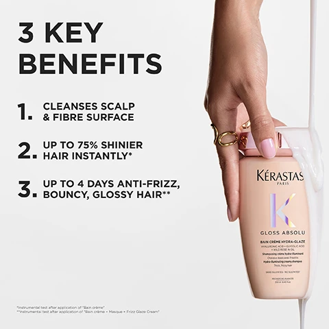 Image 1 - A hand holds a peach-colored shampoo bottle from which white shampoo pours out, next to a list of benefits that reads: 3 KEY BENEFITS 1. CLEANSES SCALP & FIBRE SURFACE 2. UP TO 75% SHINIER HAIR INSTANTLY* 3. UP TO 4 DAYS ANTI-FRIZZ, BOUNCY, GLOSSY HAIR**, and text on the bottle reads: KÉRASTASIS PARIS GLOSS ABSOLU BAIN CRÈME HYDRA-GLAZE HYALURONIC ACID + GLYCOLIC ACID + WILD ROSE IN OIL Shampooing crème hydra-illuminant Cheveux épais avec frisottis Hydra-illuminating creamy shampoo Thick, frizzy hair SANS SULFATES - NO SULFATES RECHERCHE AVANCÉE 250 ml 8.45 fl.oz., with disclaimers below saying *Instrumental test after application of Bain crème **Instrumental test after application of Bain crème + Masque + Frizz Glaze Cream. Image 2 - A split image shows a before and after comparison of a persons long, dark, wavy hair, with the before side appearing frizzy and undefined and the after side looking smooth, shiny, and with defined waves, and includes the text BEFORE, AFTER, and *illustration of the contemplated results obtained after applying the products Gloss Absolu Bain Crème Hydra-Glaze, Insta Glaze, Masque Crème Hydra-Glaze Cream, Frizz-Glaze Cream, Glaze Drops. Image 3 - A dollop of creamy white product is smeared on a light gray background, with the text CREAMY TEXTURE BAIN CRÈME HYDRA-GLAZE. Image 4 - Three scientific test tubes containing different liquids are shown on the right, next to a list of ingredients on the left. The visible text reads: INGREDIENTS, HYALURONIC ACID, GLYCOLIC ACID, WILD ROSE IN OIL. Image 5 - A promotional image displays three light pink Kerastase hair products with rose gold accents on clear stands, surrounded by light pink and white flowers against a white background, with text that reads: GLOSS ABSOLU UP TO 4 DAYS GLOSSY HAIR* MESMERISING SCENT UP TO 4 DAYS ANTI-FRIZZ* KÉRASTASE PARIS K GLOSS ABSOLU BAIN CRÈME HYDRA-GLAZE HYALURONIC ACID + GLYCOLIC ACID + WILD ROSE IN OIL Shampooing crème hydra-illuminant Cheveux épais avec frisottis Hydra-illuminating creamy shampoo Thick, frizzy hair SANS SULFATES - NO SULFATES* RECHERCHE AVANCÉE 250 ml 8.45 fl oz KÉRASTASE PARIS K GLOSS ABSOLU MASQUE CRÈME HYDRA-GLAZE 200 ml 6.76 fl oz KÉRASTASE PARIS K GLOSS ABSOLU FRIZZ-GLAZE CREAM *Instrumental test after application of Bain crème + masque + Frizz Glaze cream. Image 6 - A pale pink Kérastase shampoo refill pouch with a white cap stands on a white surface, accompanied by text that reads: HYDRA-ILLUMINATING CREAMY SHAMPOO FOR THICK FRIZZY HAIR, KÉRASTASE PARIS, GLOSS ABSOLU, BAIN CRÈME HYDRA-GLAZE, HYALURONIC ACID + GLYCOLIC ACID + WILD ROSE IN OIL, Shampooing crème hydra-illuminant, Cheveux épais avec frisottis, Hydra-illuminating creamy shampoo, Thick, frizzy hair, Fait avec -82% de plastique / Made with -82% plastic packaging*, REFILL - RECHARGE, SANS SULFATES - NO SULFATES*, RECHERCHE AVANCÉE, 500 ml 16.9 fl.oz., **Versus le format de deux Bains 250 ml. /**Than the packaging of two 250 ml Bain, and BAIN CRÈME HYDRA-GLAZE.