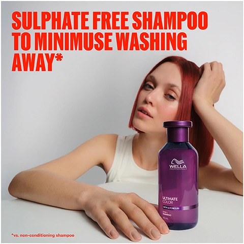 Image 1 - A woman with red hair and a white top looks at the camera with her hand in her hair, a purple Wella shampoo bottle on a white surface in front of her, with text reading SULPHATE FREE SHAMPOO TO MINIMUSE WASHING AWAY* *vs. non-conditioning shampoo and on the bottle Wella Professionals Ultimate Color With Glycine & B5 Shampoo 250 ml. Image 10 - A dark image features three light purple flowers with orange centers and dark purple foliage, alongside text that reads FRAGRANCE Unique, fruity & florential fragrance with top notes of orange zest, apple & leafy green. Image 2 - A purple Wella Professionals shampoo bottle with a dark red and black gradient background is marked with white text labels pointing to Colour Vibrancy, Scalp Soothing, Colour Safe, and Moisture, and the bottle itself displays the text ULTIMATE COLOR WITH GLYCINE & B5 STEP 1 SHAMPOO 250 ML | 8.4 FL.OZ e. Image 3 - A woman with curly reddish-brown hair holds a purple Wella Professionals Ultimate Color conditioner tube, with the text UP TO 86% LESS BREAKAGE* vs. non-conditioning shampoo visible at the bottom. Image 4 - A wet purple Wella Professionals Ultimate Color conditioner bottle is featured against a red and black background, with labels pointing to its benefits: Moisture, Anti-porosity, and Colour Safe, and the bottle itself reads Wella Professionals Ultimate Color With Glycine & B5 Step 2 Conditioner 200 ML 6.7 FL. OZ. Image 5 - A person with red hair holds a purple Wella Ultimate Color Miracle Hair Rescue spray bottle; text says UP TO 4X MORE RESISTANCE TO BREAKAGE* *vs. non-conditioning shampoo. Image 6 - A purple Wella Professionals Ultimate Color Step 2 Intense Miracle Leave-in Mask bottle with Glycine & B5, 95 ML I 3.2 FL OZ, stands against a red and black background, with overlaid text highlighting UV Protection, Anti-Breakage, Moisture, and Colour Safe. Image 7 - A hand holds a purple spray bottle from Wella Professionals dispensing a fine mist, with text on the bottle reading WELLA PROFESSIONALS ULTIMATE COLOR COLOR PROTECTION WITH VITAMINATE & B5 STEP 3 LEAVE-ON SHINE SPRAY 50ML 1.7 FL. OZ, and additional overlaid red text MIST TO ADD SHINE AND SMOOTHNESS. Image 8 - A purple spray bottle for Wella Professionals Ultimate Color with Olivate & B5 Step 3 Shine Spray, 95 ML 3.2 FL OZ, is featured against a red background with text indicating it is Colour Safe, provides Lasting Smoothness, Shine, and is Free of Animal Derived Ingredients. Image 9 - A split image shows the back of a persons head with short red hair; the left side, labeled Before, shows duller, frizzy hair, and the right side, labeled After, shows vibrant, smooth, shiny hair, with visible text reading BEFORE with non-conditioning shampoo AFTER with Ultimate Color regimen.