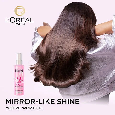 Image 2 - A woman with long, shiny brown hair is seen from behind, wearing a silver jacket, next to a pink spray bottle labeled LOréal Elvive Glycolic Gloss 2% Glycolic Acid Complex Shine Glazing Leave-On Serum; the image also displays the text LOréal Paris, MIRROR-LIKE SHINE, and YOURE WORTH IT. Image 3 - A pink LOréal Elvive Glycolic Gloss Shine Glazing Leave-in Serum bottle is displayed, with accompanying text that reads Shine Glazing Serum, Lightweight Shine with No Weighdown, Up to 10x More Smoothness for Up to 72H*, Heat Protectant Up to 230°, Up to 24H Anti-Frizz*, *Instrumental Test, and the bottle itself shows LOréal Paris Elvive 2% Glycolic Complex Glycolic Gloss Shine Glazing Leave-in Serum, Up to 10x smoothness, no weightdown, Dull, Lifeless Hair, and a registered trademark symbol. Image 4 - A stylized molecular structure with translucent pink and clear spheres on a light pink background, next to text that reads: POWERED WITH [GLYCOLIC ACID] 2% [GLYCOLIC GLOSS COMPLEX] THE FORMULA ENVELOPS THE HAIR FIBRE WITH AN INSTANT SHINE GLAZE.