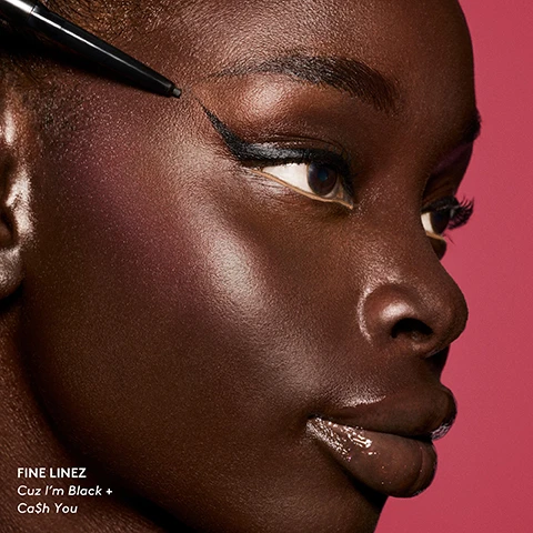 Image 2 - A person with dark skin applies black winged eyeliner while wearing glossy lips and purple blush, with the text FINE LINEZ Cuz Im Black + Ca$h You. Image 3 - A model with slicked-back brown hair, dramatic winged brown eyeliner above a white lower waterline liner, and glossy pink lips, against a plum background, displaying text that reads FINE LINEZ In Big Truffle + Wink O Pink. Image 4 - Close-up of a persons face featuring vibrant pink winged eyeliner and dark glossy lips with the text FINE LINEZ RiRi + Vanilla Killa.