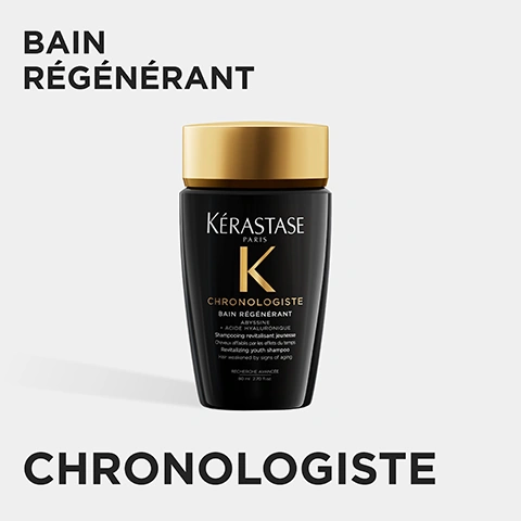 Image 1 - A Kérastase Chronologiste black shampoo bottle with a gold cap is centered on a light background, with additional text reading BAIN RÉGÉNÉRANT, KÉRASTASE PARIS, K, CHRONOLOGISTE, BAIN RÉGÉNÉRANT, ABYSSINE + ACIDE HYALURONIQUE, Shampooing revitalisant jeunesse, Cheveux affaiblis par les effets du temps, Revitalizing youth shampoo, Hair weakened by signs of aging, RECHERCHE AVANCÉE, 80 ml 2.70 fl.oz., and CHRONOLOGISTE. Image 2 - A large transparent gel-like sphere with smaller drops above it on a white background, next to the text GEL TEXTURE BAIN RÉGÉNÉRANT. Image 3 - A close-up of white, yellow, and pink freesia flowers with water droplets, red gem-like stones, and red leaves against a black background, with the text PARIS COUTURE REVITALISING & SENSUAL FRAGRANCE FREESIA, BERGAMOT & MUSK ACCORD NOTES. Image 4 - An image displays several dark, reflective spheres, one of which glows with a golden light, with the text Ingredients, PRO-XYLANE TM, OCHROPHYTA, and ALGAE. Image 5 - A hand holds a black and gold Kérastase Chronologiste Bain Régénérant shampoo bottle, from which liquid is pouring, with instructions on the left that read: HOW TO USE FOR THE BEST RESULT? 1. APPLY ON WET HAIR 2. RINSE 3. FOLLOW WITH MASQUE INTENSE RÉGÉNÉRANT AND OVERNIGHT YOUTH SERUM. Image 6 - A woman with long, wavy brown hair and bangs looks directly at the viewer, with text on the left reading CHRONOLOGISTE Youth Revitalising Care Helps Reverse 5 Signs of Aging in 1 Night* Wake Up to Fuller, Smoother, Healthier Hair** *instrumental test, after application of Serum on dryness, dullness, lack of volume, thickness, frizz **consumer test after application of Bain + Mask + Night Serum, 90 consumers. Image 7 - Four black and gold Kerastase Chronologiste hair care products are shown with the text Chronologiste Revitalising Routine For Hair Weakened By Signs Of Aging, followed by 1. Bathe, identifying the Bain Régénérant, 2. Treat, identifying the Masque Intense Régénérant, 3. Style, identifying the Huile de Parfum, and 4. Night, identifying the Sérum Universel Youth Serum.