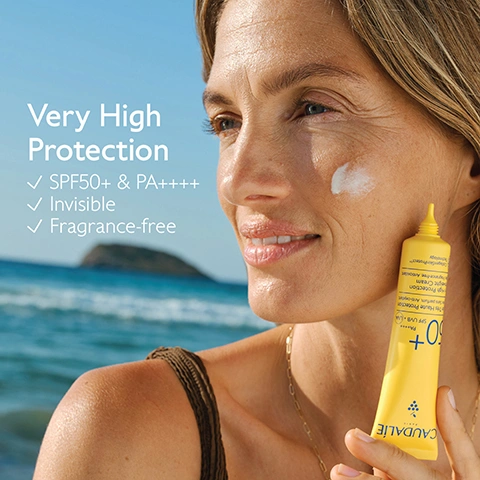 Image 1 - A woman with a dab of sunscreen on her cheek holds a yellow sunscreen tube, smiling at a sunny beach with the ocean in the background, with text Very High Protection, SPF50+ & PA++++, Invisible, Fragrance-free, and Caudalie Paris 50+ UVA UVB PA++++ High Protection visible on the image. Image 2 - A smiling woman in a dark bikini top with a young blonde child in a yellow swimsuit leaning on her shoulder at a sunny beach, with text that reads Suitable for children and babies. Image 3 - A hand holds a yellow Caudalie sunscreen tube with a drop of cream emerging from the nozzle, against a clear blue sky, with visible text reading Super-light texture Fragrance-free, and on the tube CAUDALIE 50+ PA++++ SPF UVA UVB de Très Haute Protection Invisible Sans parfum Very High Protection Lightweight Cream Invisible Fragrance-free CollagenSkin Technology. Image 4 - A yellow tube of Caudalie sunscreen with an SPF of 50+ is partially buried in sand against a blue background, with visible text reading CollagenSkin Protect™, Antioxidant, preserve the skins collagen, CAUDALIE PARIS, 50+ PA++++ SPF UVB + UVA, Fluide Très Haute Protection, Invisible Sans Parfum, Antioxydant, Very High Protection Lightweight Cream, Invisible, Fragrance-free, Antioxidant, CollagenSkinProtect™ Technology, 4 organic sunscreen filters, and Optimal broad-spectrum protection against UVA and UVB rays. Image 5 - A smiling woman with wet hair has a dollop of white cream on her cheek against a blue sky and ocean background, with the text Water-resistant. Image 6 - The image displays two yellow Caudalie SPF 50+ sunscreen tubes with cream swatches; the first product is titled Very High Protection Cream, also showing text CAUDALIE PARIS, Crème Très Haute Protection, SPF UVA on its tube, and is described with Benefit High protection & anti-wrinkle, Texture Invisible & velvety finish, Sunny fragrance, and Perfect for sensitive skin; the second product is titled Very High Protection Lightweight Cream, also showing text CAUDALIE PARIS, Crème Très Haute Protection, SPF UVA on its tube, and is described with Benefit High protection & antioxidant, Texture Invisible & super-light, Fragrance-free, and Perfect for sensitive skin. Image 7 - A collection of seven Caudalie suncare products is displayed on a light-colored surface against a blue wooden background, including a yellow stick, two yellow tubes, two yellow spray bottles, and two oil bottles (one clear blue, one brown), with visible text Suncare collection, Face protection, Face & body protection, and product labels reading Caudalie 50+ on the stick, Caudalie Paris 50+ Crème Très Haute Protection Very High Protection Cream on the two tubes, Caudalie Paris 30 Spray Invisible Haute Protection Invisible High Protection Spray on the first yellow spray bottle, Caudalie Paris 50 Spray Invisible Haute Protection Invisible High Protection Spray on the second yellow spray bottle, Caudalie Paris 50+ Huile Solaire Haute Protection Solaire Invisible Sun Oil High Protection Invisible Sun Oil on the clear blue oil bottle, and Caudalie Paris 50 Huile Solaire Haute Protection Invisible Sun Oil High Protection Invisible Sun Oil on the brown oil bottle. Image 8 - A yellow background with a blue outline drawing of a cosmetic tube on the right and text on the left that reads How to recycle the Lightweight Cream SPF50+ and Recycle the entire packaging in the recycling bin. Image 9 - A hand holds a crumpled dark blue plastic bottle and a crumpled teal plastic bottle against a blue sky. Caudalie collects and recycles as much plastic waste from the ocean as it generates as a brand, 100% OCEAN PLASTIC COLLECT.