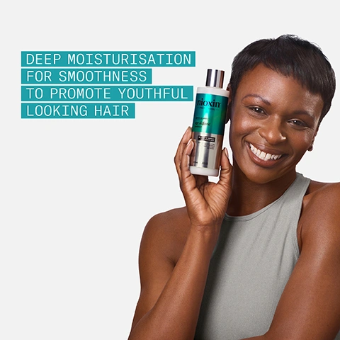 Image 1 - A smiling woman with short dark hair holds a Nioxin conditioner bottle, with text on the left reading DEEP MOISTURISATION FOR SMOOTHNESS TO PROMOTE YOUTHFUL LOOKING HAIR, and text on the bottle reading Nioxin PRO CLINICAL ACTIV-RENEWAL age defense conditioner NUTRITIVE COMPLEX HYALURONIC ACID DEEP MOISTURIZATION FOR SMOOTHNESS & STRENGTH AGAINST BREAKAGE 240mL 8.1FL.OZ. Image 2 - A close-up of a creamy white substance with swirled textures, overlaid with text points that read: LIGHTWEIGHT, FOR DAILY USE, FOR ALL HAIR TYPES, STRENGTHENS THE HAIR AGAINST BREAKAGE. Image 3 - The image shows SKIN-LOVING INGREDIENTS with three sections: Niacinamide, depicted as a blue liquid droplet, described as a form of vitamin B3, helps nourish the hair root, improves scalp skin barrier; Caffeine, depicted as a pile of coffee beans, described as helps support hair follicles, maintains the skin barrier, improves blood microcirculation with massage; and Hyaluronic acid, depicted as clear gel bubbles, described as provides moisturization and strength against breakage to promote a healthier environment for hair growth. Image 4 - A smiling Black woman holds a Nioxin Age Defense conditioner bottle, positioned next to a white box containing instructions and the text: HOW TO USE 1 After shampooing, work evenly through scalp and hair. 2 Leave on 3-5 minutes. 3 Rinse well. The bottle label shows the text: nioxin PRO-CLINICAL ACTIV-RENEWAL age defense conditioner NUTRITIVE COMPLEX WITH HYALURONIC ACID DEEP MOISTURIZATION REDUCES HAIR LOSS & STRENGTH AGAINST BREAKAGE 240mL 8.1 FL OZ. Image 5 - A white and teal Nioxin Pro Clinical Activ-Renewal Age Defense conditioner bottle with a silver cap is displayed on a light blue background with a white cream smudge, next to icons listing product features as Sulfate-Free, Silicone-Free, Paraben-Free, Coloured hair friendly, and Dermatologically tested, and the bottle itself reads nioxin PRO CLINICAL ACTIV-RENEWAL age defense conditioner / après-shampooing NUTRACTIVE COMPLEX/COMPLEXE +HYALURONIC ACID DEEP MOISTURIZATION FOR SMOOTHNESS TO PROMOTE YOUTHFUL LOOKING HAIR +ACIDE HYALURONIQUE HYDRATATION EN PROFONDEUR POUR UNE CHEVELURE DOUCE DAPPARENCE JEUNE 240mL | 8.1 FL OZ. Image 6 - The image displays three Nioxin Pro Clinical Activ-Renewal Age Defense hair products, including a Detoxifying Shampoo described as Cleanses & Purifies with BHA, a Strengthening Conditioner described as Strengthens & Moisturises with Hyaluronic Acid, and a Lightweight Serum described as Preserves Fullness, Smoothness & Natural Color with Black Oat Peptides, all presented under the prominent text COMPLETE YOUR ANTI-AGEING REGIME.