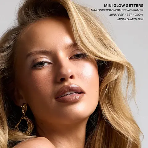 Image 1 - A close-up of a woman with blonde hair and glowing skin, wearing a gold earring, with text overlay reading MINI GLOW GETTERS MINI UNDERGLOW BLURRING PRIMER MINI PREP - SET - GLOW MINI ILLUMINATOR. Image 2 - Three mini Iconic London cosmetic products are displayed, including a dropper bottle of Underglow Blurring Primer, a spray bottle of Prep-Set-Glow, and a small dropper bottle of Illuminator, with the visible text MINI GLOW GETTERS, MINI UNDERGLOW BLURRINGPRIMER FAN FAVOURITE, SELL OUT PRIMER, MINI PREP - SET- GLOW OUR BEST SELLING VIRAL PREP AND SETTING MIST, MINI ILLUMINATOR OUR MUST - HAVE HIGHLIGHTER WITH OVER 1900 5 STAR REVIEWS. Image 3 - Close-up of two swatched cosmetic products, the left a shimmery rose gold liquid and the right a creamy beige primer with streaks, with visible text on the left Prep - Set - Glow Cucumber Extract ✔ Chamomile ✔ Mica ✔ and on the right Underglow Blurringprimer ✔ Soft Focus Blurring Powders ✔ Vitamin C ✔ Natural Looking Glow. Image 4 - Several shimmering bronze-gold liquid drops are scattered on a white background with the text ILLUMINATOR SHADE ORIGINAL. Image 5 - A woman with long blonde wavy hair and glowing skin looks at the camera while wearing a shimmering black top, accompanied by product reviews reading: 5 stars UNDERGLOW BLURRING PRIMER So smooth to put on my face, its like silk. It really gives radiance to my skin and a perfect base. I love it so have ordered more! Annie. 5 stars PREP – SET – GLOW I have been buying this product for 5 years now. Not only does it smell lovely but it works so well and really makes my make up look good afterwards. Would definitely recommend it! Sam. 5 stars ILLUMINATOR I use this with matte foundation. Gives me a bit of illumination. Ive received compliments on how healthy my skin looks. Stacey.