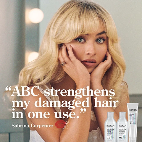 Image 1 - A woman with long blonde hair and bangs, with light blue eyes, cups her face with her hands, next to three Redken hair product bottles on the right, with the visible text ABC strengthens my damaged hair in one use. Sabrina Carpenter. Redken Acidic Bonding Concentrate.  Image 2 - A white Redken Acidic Bonding Concentrate shampoo bottle, partially covered in white foam, with surrounding text that reads: REDKEN 5TH AVENUE NYC, acidic bonding concentrate shampoo shampooing, intense conditioning fortifying optimized for all hair types & textures demanding processed hair cheveux exigants, traités en salon, CITRIC ACID +, SALON EXPERT CONCENTRATION, 7% bonding care complex, 10.1 fl oz 300 ml e, UP TO 2X LESS BREAKAGE*, UP TO 89% EASIER TO DETANGLE*, UP TO 9X SMOOTHER*, and *ACIDIC BONDING CONCENTRATE SHAMPOO & CONDITIONER VS. NON-CONDITIONING SHAMPOO. Image 3 - A white product bottle with an open cap and a dollop of cream on top is shown against a dark background with text that reads: UP TO 2X LESS BREAKAGE* UP TO 89% EASIER TO DETANGLE* UP TO 9X SMOOTHER* *ACIDIC BONDING CONCENTRATE SHAMPOO & CONDITIONER VS. NON-CONDITIONING SHAMPOO. Image 4 - A white Redken Acidic Bonding Concentrate tube, a leave-in treatment containing Citric Acid+ and a 5% Bonding Care Complex, is shown on a dark background, with visible text promoting its benefits: Combats 1 year of visible damage in 1 use*, Up to 10x smoother hair**, Up to 2x less breakage**, Heat protection up to 230°C**. Image 5 - A before and after comparison image of blonde curly hair, with the left side showing frizzy, less defined curls and the right side showing more defined, smoother curls, accompanied by the text BEFORE, AFTER ONE USE*, and *SYSTEM OF ACIDIC BONDING CONCENTRATE SHAMPOO, LIGHTWEIGHT LIQUID CONDITIONER & LEAVE-IN. Image 6 - A split image showing a womans long blonde hair from the back; on the left, the hair is dull and textured, and on the right, it is smooth and shiny with the text BEFORE, AFTER ONE USE*, and *SYSTEM OF ACIDIC BONDING CONCENTRATE SHAMPOO, CONDITIONER & LEAVE-IN. Image 7 - A split image displays a woman with long wavy brown hair, before on the left with frizzy hair, and after one use on the right with smoother, shinier hair, with visible text reading BEFORE, AFTER ONE USE*, and *SYSTEM OF ACIDIC BONDING CONCENTRATE SHAMPOO, CONDITIONER & LEAVE-IN. Image 8 - The image shows white product smears and foam bubbles on a light gray background, with black text that reads CITRIC ACID + BONDING CARE COMPLEX BUILD BONDS + STRENGTHENS HAIR. Image 9 - A persons hands are shown applying a product to damp, dark brown hair, with instructions Apply on mid-lengths & ends of clean, damp hair. Do not rinse, and branding Redken Labs 400 11:469:222 Redken Labs.Image 10 - The image displays four white Redken Acidic Bonding Concentrate hair care products: a shampoo, conditioner, leave-in treatment, and a 24/7 night & day serum, with the text HAIR REPAIR STARTS HERE, Redken 5th Avenue NYC, Acidic Bonding Concentrate shampoo with 7% Citric Acid+ 10.1 fl oz 300 ml, Acidic Bonding Concentrate conditioner with 11% Citric Acid+ 10.1 fl oz 300 ml, Acidic Bonding Concentrate leave-in treatment with 5% Citric Acid+ 5.1 fl oz 150 ml, Acidic Bonding Concentrate 24/7 night & day serum with 7% Citric Acid+ .34 fl oz 100 ml, and additional details including Salon Expert Concentration, Redken Labs 400, and Red 5502.