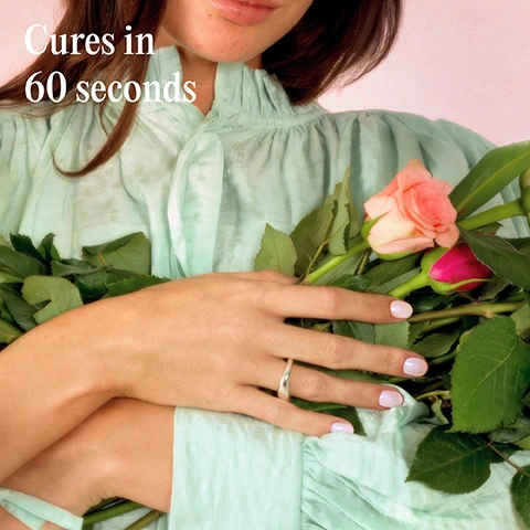 Image 1 - A woman in a light green ruffled blouse holds pink roses and green leaves, with light pink nail polish and a silver ring visible on her hand, against a light pink background, with the text Cures in 60 seconds. Image 2 - A black Mylee gel polish bottle and its brush lie on a light fabric with ivy leaves, alongside three icons stating CRUELTY-FREE, VEGAN, and HEMA-FREE. Image 3 - An infographic illustrating four steps of a gel nail manicure, showing a hand with a nail being buffed with a block labeled mylee, a base coat applied under an LED lamp displaying 60 SEC, a color coat applied under an LED lamp displaying 60 SEC, and a finished nail being wiped clean, with the text Step-by-step PREP File nails to shape and use a Mylee Buffing Block* to gently remove shine from the nail plate. Wipe your nails with a dash of Mylee 2-in-1 Nail Prep & Wipe* on a Lint Free Wipe* to remove any oils. If youre prone to lifting, apply the Mylee Dehydrator* followed by the Mylee Acid-Free Primer*. BASE Apply a thin layer of your chosen Mylee Base Coat* and cure for 60 seconds using a Mylee LED Lamp*. COLOUR Brush on your favourite Mylee Gel Polish shade and cure for 60 seconds. Build up the opacity in thin coats, curing each layer for a smooth, even finish. Dont forget to cap the free edge by running some polish along the tip of your nail. FINISH Seal the deal with a Mylee Top Coat* and cure for 60 seconds. If using a regular one, remove the tacky layer with 2-in-1 Nail Prep & Wipe on a Lint Free Wipe. Alternatively skip this step and use a Mylee No-Wipe Top Coat*! Wash your hands, apply Mylee Nail & Cuticle Oil*, moisturise, and enjoy your salon-quality mani for up to 3 weeks! *Product sold separately. Image 4 - A black bottle of mylee GEL POLISH with a stylized M logo shows pearlescent polish spilling from its top, with an applicator brush handle reading mylee above it, and a green circle in the corner displaying Pearlescent. Image 5 - A woman with long dark hair wears a light green top, holding a pale yellow rose with a black Mylee nail polish bottle balanced on it, showcasing her nails painted a light pink shade, with the text Chip-free for up to 3 weeks and mylee POLISH. Image 6 - A black bottle of Mylee gel polish with its brush cap detached and showing a light purple polish on the brush, rests on a cream-colored fabric with green and yellow variegated leaves and a decorative brown butterfly, with the visible text Applies like a normal polish and mylee GEL POLISH. Image 7 - A mylee black nail polish bottle with a red neck and a brush dripping red nail polish, surrounded by text describing its features: Vegan, Lasts up to 3 weeks, Cures in 30-60 seconds, Hema-free, Applies like normal polish, No dry time-cures under LED lamp.