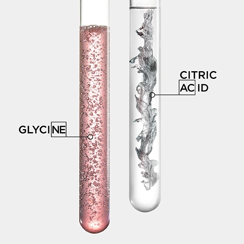 Image 1 - Two test tubes are shown, one on the left contains a pink bubbling liquid labeled GLYCINE, and the one on the right contains clear liquid with a swirling grey substance labeled CITRIC ACID. Image 2 - A woman with long, wavy, reddish-brown hair and gold necklaces looks forward, next to Kérastase Première hair products and text that reads: PREMIÈRE RANGE RESTORES HAIRS ORIGINAL STRENGTH* DUAL ACTION REPAIR HAIRCARE FREES HAIR FROM CALCIUM BUILDUP THAT LEADS TO BREAKAGE HELPS RECONNECT BROKEN KERATIN LINKS *Instrumental test on bleached hair after continued use of the full Première routine vs. non-bleached hair. Image 3 - The image displays three split panels showing before and after results of hair treatments on blonde, straight brown, and curly brown hair, with each panel labeled BEFORE, AFTER, and FULL PROGRAMME RITUAL AND STYLING, and a fourth panel featuring Kérastase hair care products. Image 4 - A smiling man with dark curly hair and a beard, wearing a navy suit and white shirt, looks at the viewer, alongside text that reads PREMIÈRE, HOVIG ETOYAN, Global Professional Ambassador, and Damaged hair is the n°1 concern in our salon. It is great to now have a complete exclusive protocol to offer the best repair to our clients. Image 5 - The image shows two Kérastase Première hair care products, a silver pump bottle and a white shampoo bottle, on a pink and white background, with text above reading PREMIÈRE DAMAGE REPAIR HAIR CARE DUO; the silver pump bottle label reads KÉRASTASE PARIS K PREMIÈRE CONCENTRÉ DÉCALCIFIANT ULTRA-RÉPARATEUR [HA + 8% CITRIC ACID + GLYCINE] Sérum pré-shampooing décalcifiant réparateur Tous types de cheveux abîmés Decalcifying repairing pre-shampoo All types of damaged hair RINCEZ 100 mL e 3.4 fl.oz.; the white shampoo bottle label reads KÉRASTASE PARIS K PREMIÈRE BAIN DÉCALCIFIANT RÉPARATEUR [HA + 8% CITRIC ACID + GLYCINE] Shampooing décalcifiant réparateur Tous types de cheveux abîmés Decalcifying repairing shampoo All types of damaged hair RINCEZ 80 mL e 2.7 fl.oz.; and text below the bottles indicates 0 ACTIVATE and 1 BATHE.