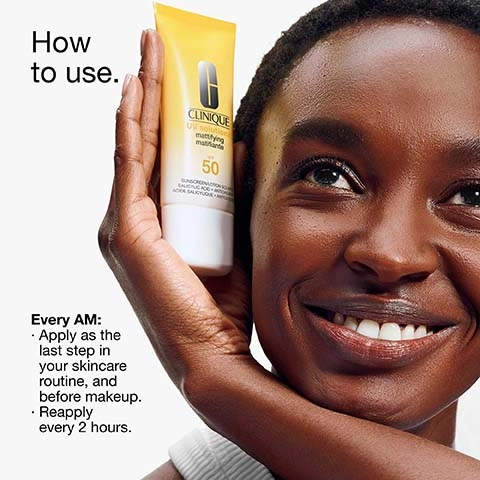 Image 2 - A smiling person with dark skin holds a yellow and white tube of Clinique sunscreen, with text visible that reads How to use. CLINIQUE UV solution mattifying matifiante SPF 50 SUNSCREEN LOTION SOLEIL SALICYLIC ACID + ACIDE SALICYLIQUE. Every AM: Apply as the last step in your skincare routine, and before makeup. Reapply every 2 hours. Image 3 - The image displays Formula facts on a yellow background with a wavy liquid line and bubbles at the top, listing Clinical expertise: Dermatologist developed, Dermatologist tested, Ophthalmologist tested, Safe for sensitive skin, Safe for contact lens wearers, Safe for blemish-prone skin, Non-comedogenic, Allergy tested, Fragrance free, and Free of: Fragrance, Oil, Sodium lauryl sulfate, Sodium laureth sulfate, Drying alcohol. Image 4 - Four Clinique matte skin essential products are displayed on a white background, with the visible text: Matte skin essentials. 1. Anti-blemish treatment, Clinique anti-blemish solutions clinical advanced clearing gel, Visibly clears and helps prevent blemishes. 2. Mattifying SPF 50, Clinique UV solutions mattifying mattifiante SPF 50, Controls excess shine all day and helps protect from UV rays. 3. Skin-clearing foundation, Clinique anti-blemish solutions liquid makeup fond de teint liquide anti-imperfections, Helps cover, clear, and prevent blemishes. 4. Makeup remover, Clinique take the day off cleansing balm baume démaquillant, Melts away makeup and SPF. Image 5 - The image displays a clear dish of white powder and a clear dish of yellow liquid, with text reading: Mattifying sunscreen, Antioxidants help fight skin-damaging free radicals, and Salicylic acid helps reduce pore-clogging oil and refine skins texture.