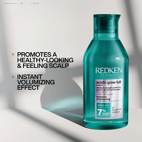 Image 1 - A teal Redken shampoo bottle with a pink and teal label stands on a light background, displaying text REDKEN 5TH AVENUE NYC acidic grow full system density & strength system for gamme densité et force pour: thin or flat hair cheveux fins ou plats shampoo shampooing AZELAIC ACID + 7% densifying complex pH BALANCED FORMULA 10.1 fl oz 300 ml e, while to its left, the text PROMOTES A HEALTHY-LOOKING & FEELING SCALP and INSTANT VOLUMIZING EFFECT are visible, along with smaller text REDKEN LABS 400 11:469:222 at the top. Image 2 - A teal Redken conditioner bottle is shown on a light background, featuring text on its label REDKEN 5TH AVENUE NYC, acidic grow full system, density & strength system for gamme densité et force pour: thin or flat hair cheveux fins ou plats, conditioner après-shampooing, AZELAIC ACID +, 7 % densifying care complex, pH BALANCED FORMULA, 10.1 fl oz 300 ml e, while to the left, additional text states CLINICALLY-TESTED TO RESPECT THE SCALP BARRIER*, INSTANT VOLUMIZING EFFECT, IMMEDIATE SOFTNESS, and a footnote *Based on an instrumental study of 34 panelists using Acidic Grow Full System Shampoo, Conditioner, and Leave-in Serum. Image 3 - A teal colored Redken hair serum spray bottle with a white pump applicator is displayed on a light background, featuring prominent text on the left that states SCIENTIFICALLY PROVEN TO REDUCE HAIR FALL DUE TO BREAKAGE FROM BRUSHING, HELPS REBALANCE SCALPS NATURAL ACIDIC PH, and LIGHTWEIGHT, NON-GREASY FORMULA & FINISH; the bottles label contains text reading REDKEN 5TH AVENUE NYC acidic grow full system density & strength system for gamme densité et force pour: thin or flat hair cheveux fins ou plats scalp & hair serum sérum cuir chevelu et cheveux AZELAIC ACID + 5 % strength complex pH BALANCED FORMULA 3.4 fl oz 100 ml e, while smaller text at the top of the image shows REDKEN LABS 400 and 11:469:222. Image 4 - The image shows a teal spray bottle for hair on a white background, next to text that highlights the products features and details, which reads REDKEN LABS 400 11:469:222, DENSIFYING SPRAY: INSTANT ROOT LIFTING, FULLER-LOOKING HAIR, ADDS VOLUME, and on the bottle label REDKEN 5TH AVENUE NYC acidic grow full system density & strength system for thin or flat hair cheveux fins ou plats instant densifying spray spray densité instantanée AZELAIC ACID + 5% densifying complex pH BALANCED FORMULA 6.4 fl oz 190 ml. Image 5 - A split-panel image shows a blonde womans hair before and after a treatment, with her hair on the left appearing less voluminous and on the right looking noticeably thicker and fuller, accompanied by the text BEFORE, AFTER*, and *After one use of Acidic Grow Full System Shampoo, Conditioner, Serum and Spray. Image 6 - A before and after comparison shows a woman with dark hair, on the left her hair appears thinner at the hairline and flatter, while on the right her hair looks visibly thicker, fuller, and shinier, with text reading BEFORE, AFTER*, and *After one use of Acidic Grow Full System Shampoo, Conditioner, Serum and Spray. Image 7 - A split image shows a man before and after hair treatment, with the left side labeled BEFORE showing his hair flatter and parted, and the right side labeled AFTER* showing his hair fuller and wavier, with a small note stating *After one use of Acidic Grow Full System Shampoo, Conditioner, Serum and Spray. Image 8 - The image presents a fragrance profile displaying three visual notes: a stack of lemons with a sliced half on top, a purple verbena flower, and an orange amber stone, accompanied by the text FRAGRANCE PROFILE, REDKEN LABS 400, 11:469:222, REDKEN LABS, //SWEET LEMON, //VERBENA, //AMBER, two downward pointing triangles, and a series of eight forward slashes. Image 9 - A close-up shows hands massaging lathering shampoo into wet hair, with visible text that reads APPLY TO WET HAIR, Lather & rinse, REDKEN LABS 400, 11:469:222, and REDKEN LABS. Image 10 - A hand applies white hair product to wet, light brown hair strands, with text overlays REDKEN LABS 400, 11:469:222, REDKEN LABS, and APPLY TO MID-LENGTHS TO ENDS. Image 11 - A persons hand holds a blue-green Redken 5th Avenue NYC Acidic Grow Full system for density & strength spray bottle, applying the product to the parted roots of damp hair, with prominent text on the right side reading SPRAY ONTO ROOTS OF CLEAN, DAMP HAIR and massage into scalp. Image 12 - A hand holds a blue and white Redken spray bottle, applying product to the parted, damp hair and scalp of a person, with visible text reading REDKEN 5TH AVENUE NYC, acidic grow full, vitality & strength system for, and instructions SPRAY ONTO ROOTS OF CLEAN, DAMP HAIR and massage into scalp, plus additional border text REDKEN LABS 400, 11:469:222, and REDKEN LABS. Image 13 - The image features four teal-colored Redken hair products, labeled 1 SHAMPOO, 2 CONDITIONER, 3 SCALP SERUM, and 4 DENSIFYING SPRAY, with large text above reading INSTANTLY THICKER, FULLER-LOOKING HAIR*. All products are from REDKEN 5TH AVENUE NYCs acidic grow full system, designed for density and strength for thin or flat hair, with Azelaic Acid + and a pH Balanced Formula. The Shampoo and Conditioner (10.1 fl oz) both feature a 7% densifying complex, while the Scalp & Hair Serum (3.4 fl oz) contains a 5% strength complex, and the Instant Densifying Spray (6.4 fl oz) contains a 5% densifying complex. Smaller text on the right edge reads REDKEN LABS 400 11:409:222, and a footnote reads *Shampoo + conditioner + serum + spray vs non-conditioning shampoo.