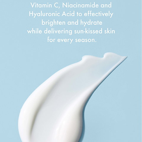A smooth white creamy swipe of product on a light blue background with the text Vitamin C, Niacinamide and Hyaluronic Acid to effectively brighten and hydrate while delivering sun-kissed skin for every season.