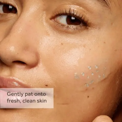 Close-up of glowing skin with Dew Bank Water Serum droplets, gently patted onto clean skin.. No7 Dew Bank Water Serum with encapsulated oil bubbles and dropper, highlighting a dewy glow formula. No7 Dew Bank Water Serum bottle shown as step 3 in a skincare routine: cleanse, tone, treat, moisturise, protect.
