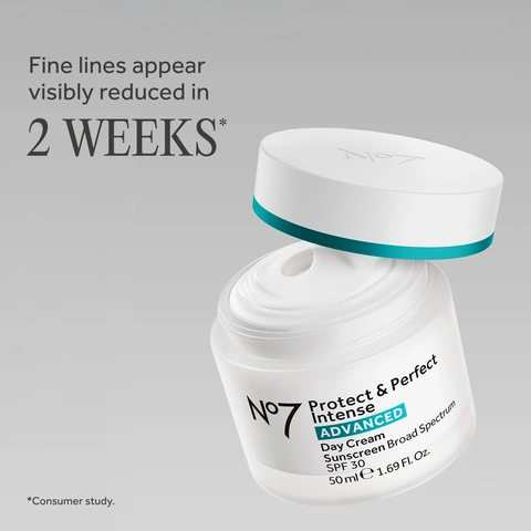 Image 2-noseven-en_US - Open jar of white face cream with floating lid labeled No7 Protect & Perfect Intense Advanced Day Cream SPF 30. Image 3-noseven-en_US - Open teal jar of white face cream labeled No7 Protect & Perfect Intense ADVANCED Night Cream.