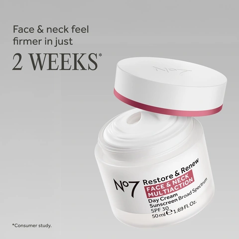 Image 3-noseven-en_US - Open white jar with cream inside, labeled No7 Restore & Renew Face & Neck Multiaction Day Cream SPF 30. Image 4-noseven-en_US - Open pink jar filled with white cream labeled No7 Restore & Renew Face & Neck Multi Action Night Cream.