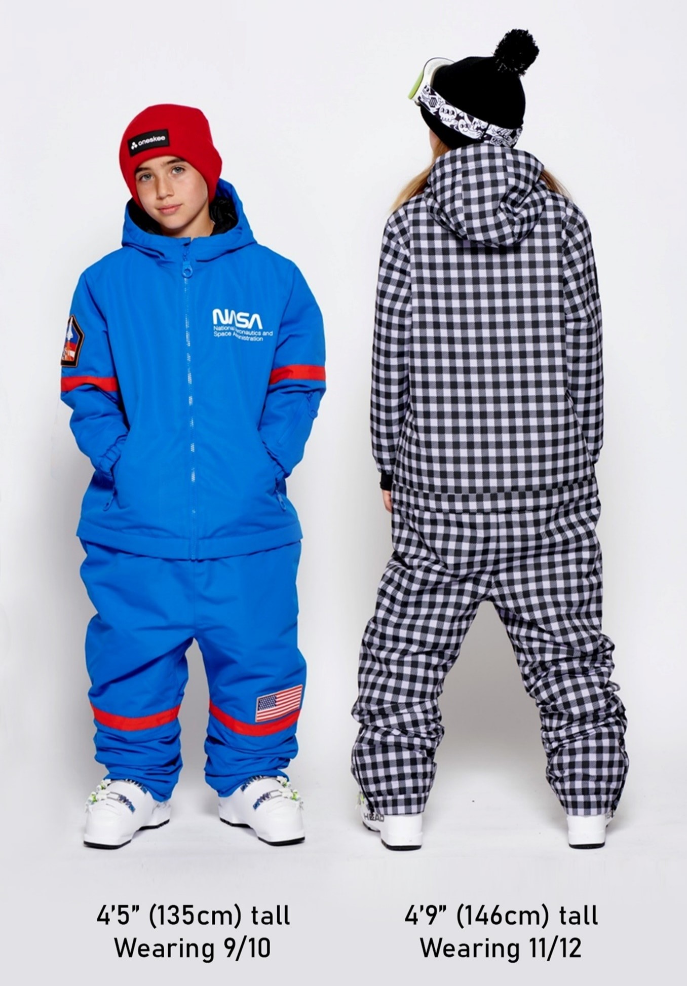 Two children modelling Ski Suits, the model on the left is 4'5" (135cm) tall Wearing 9/10. The model on the right is 4'9" (146cm) tall Wearing 11/12