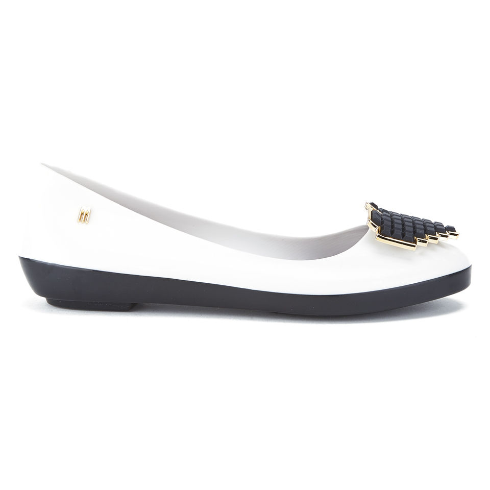 white and gold flats