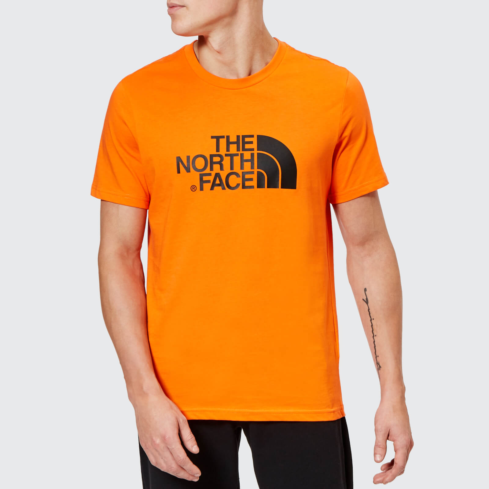 orange north face top