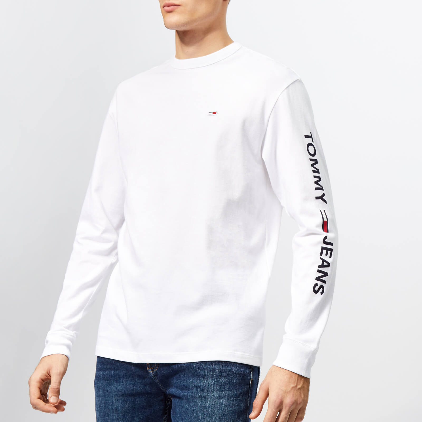 white long sleeve shirt and jeans