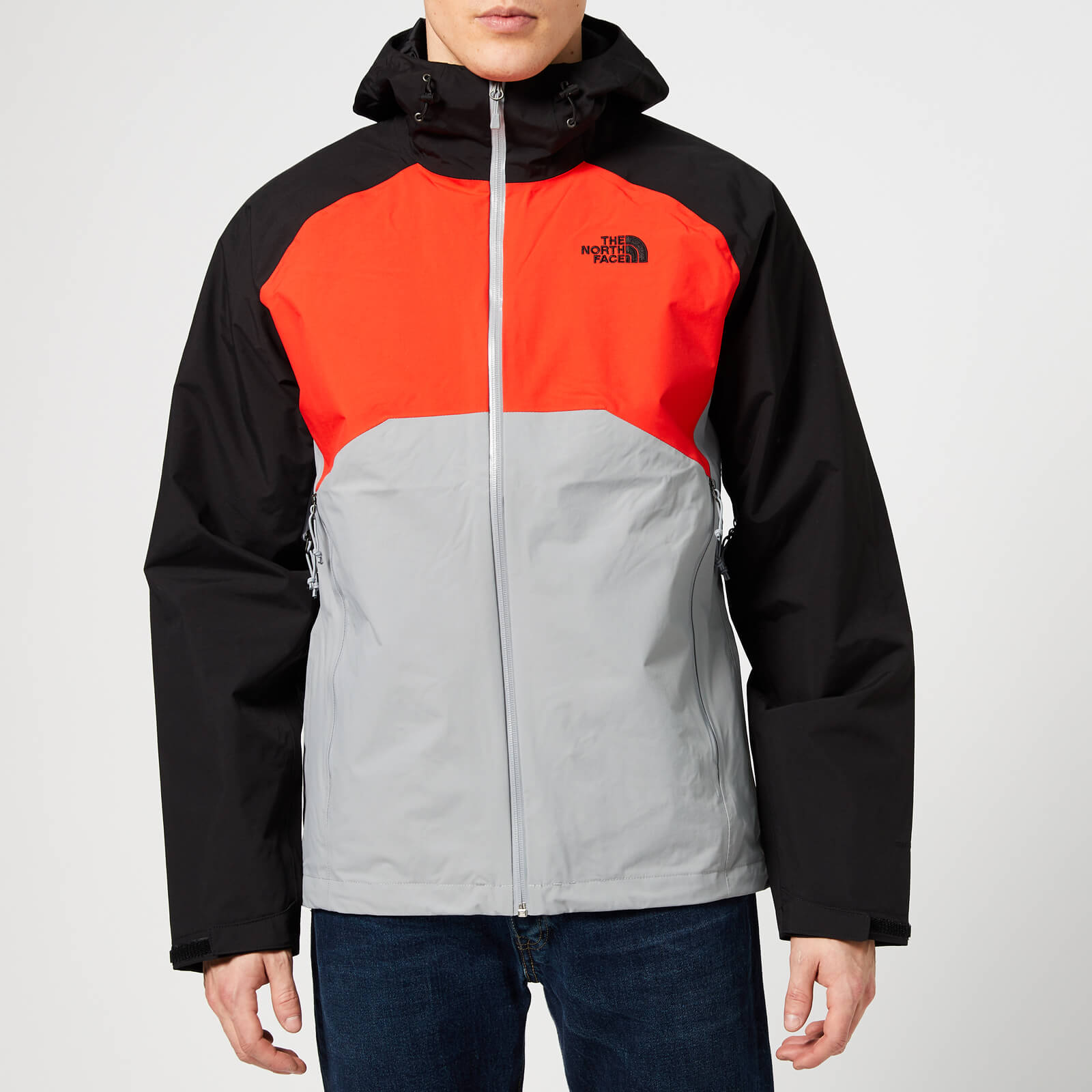 grey and red north face jacket