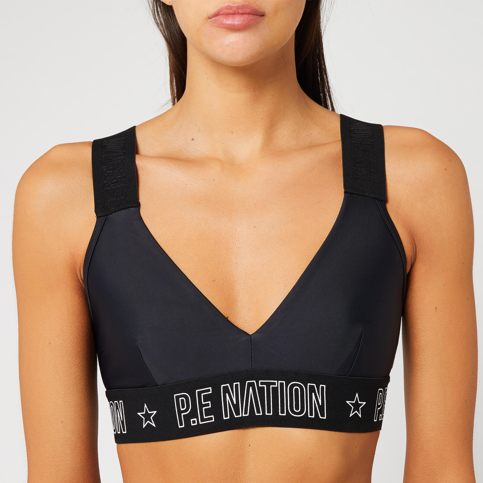 pe nation motion strike sports bra