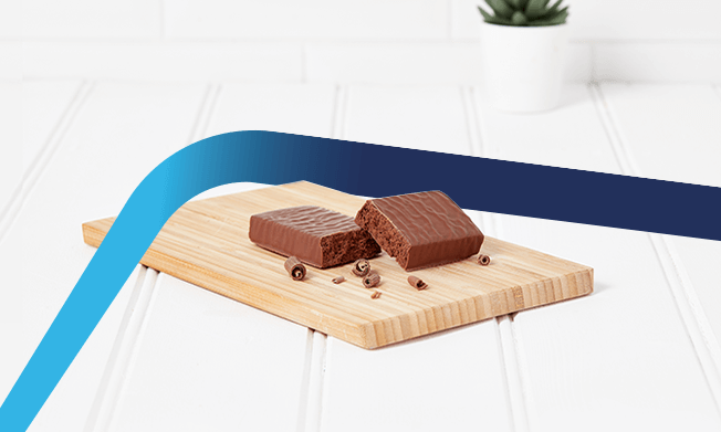 OPTIFAST chocolate flavoured meal replacement bar on chopping board