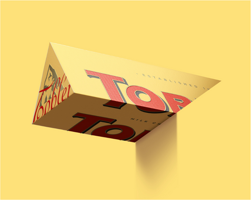 Toblerone Bar Hanging Over a yellow ledge.