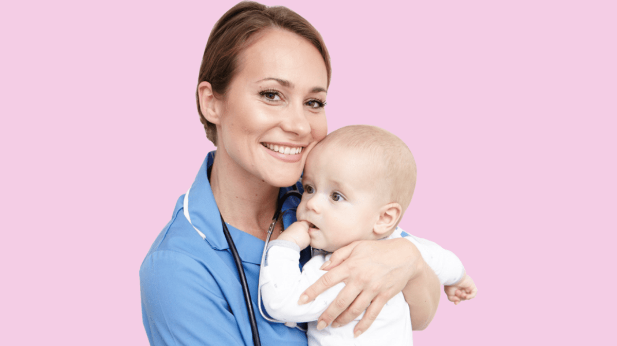 The modern midwife with stethoscope holding a baby in front of pink background